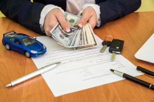 male s hands signing car contract claim form calculator dollar car 359031 12216